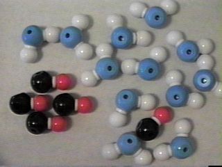 Models showing a dissolved solute molecule.
